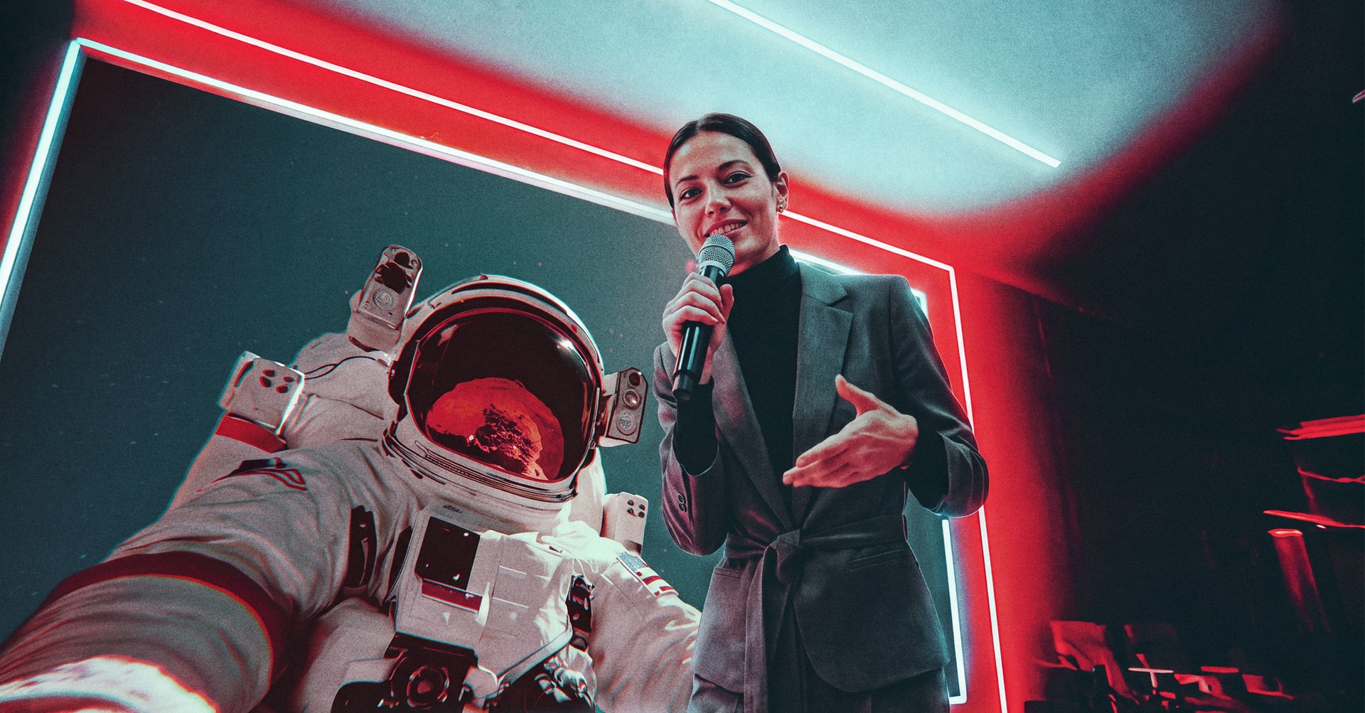woman with microphone on stage