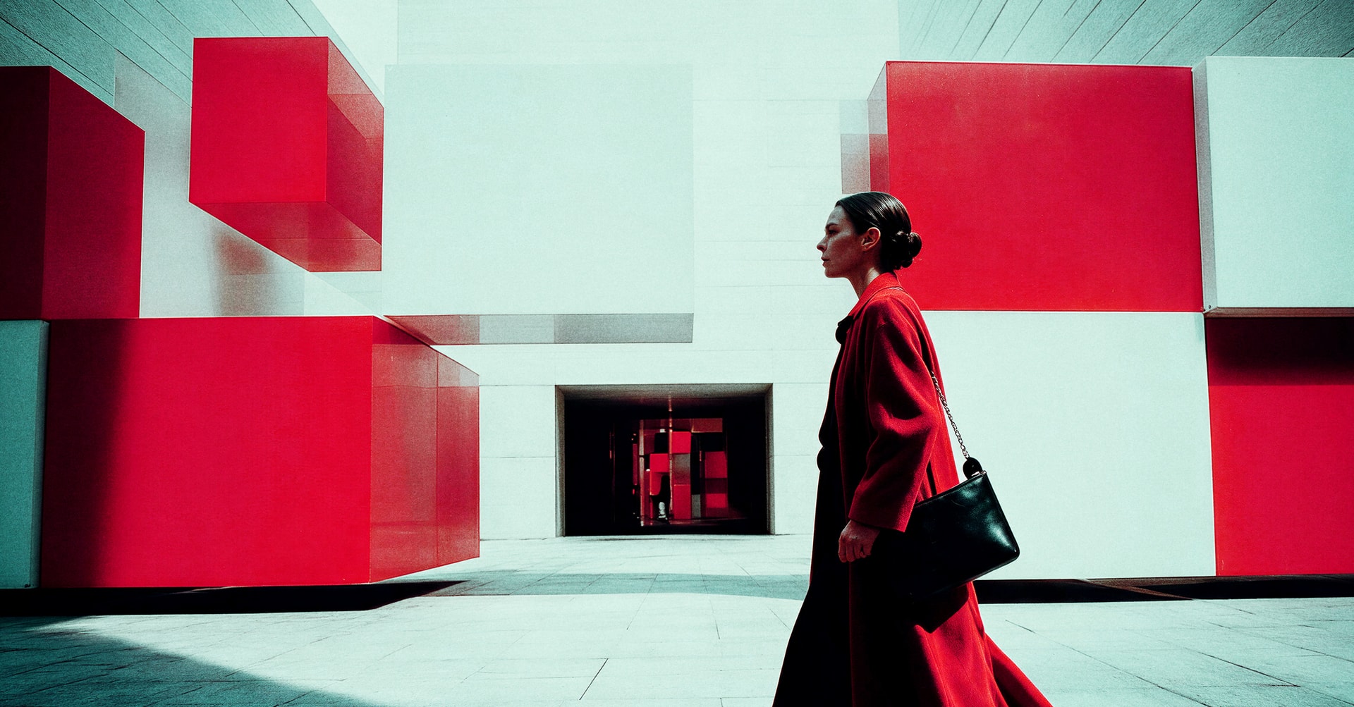 woman walking next to red modules
